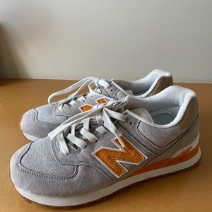 New Balance 574 mens grey and yellow tennis shoes